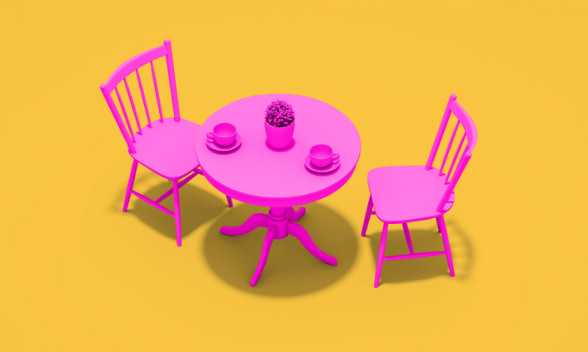 Ett rosa bord med rosa stolar.